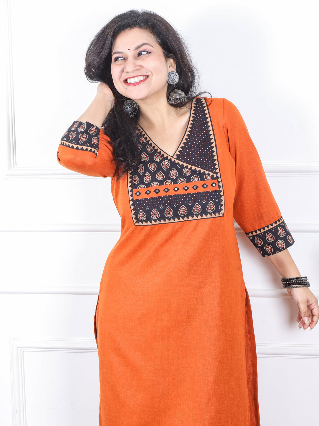 Dua Pumpkin Orange with Ajrak Print Patch Angrakha Style Neck Magic Linen Kurti