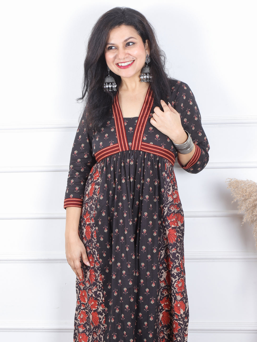 Dua Ebony Black Kalamkari Floral Printed in Alia Cut Style Cotton Kurti