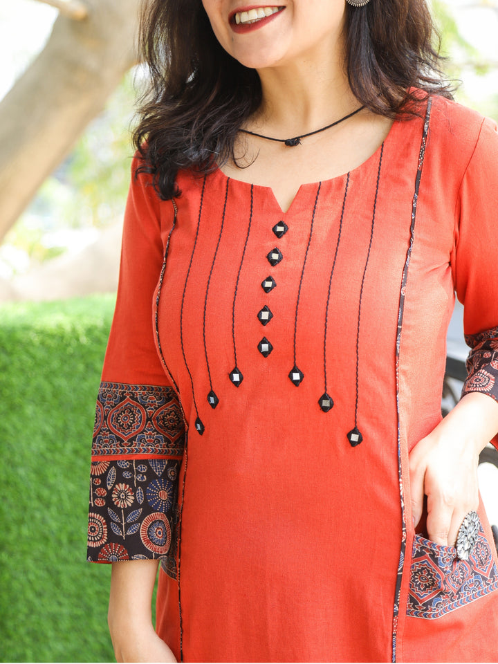 Aafeemi Burnt Orange Mirror Neck Work with Pocket Cotton Kurti