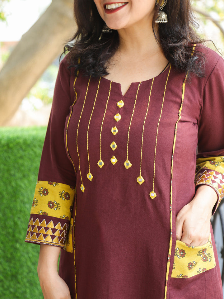 Aafeemi Plum Burgundy Mirror Neck Work with Pocket Cotton Kurti