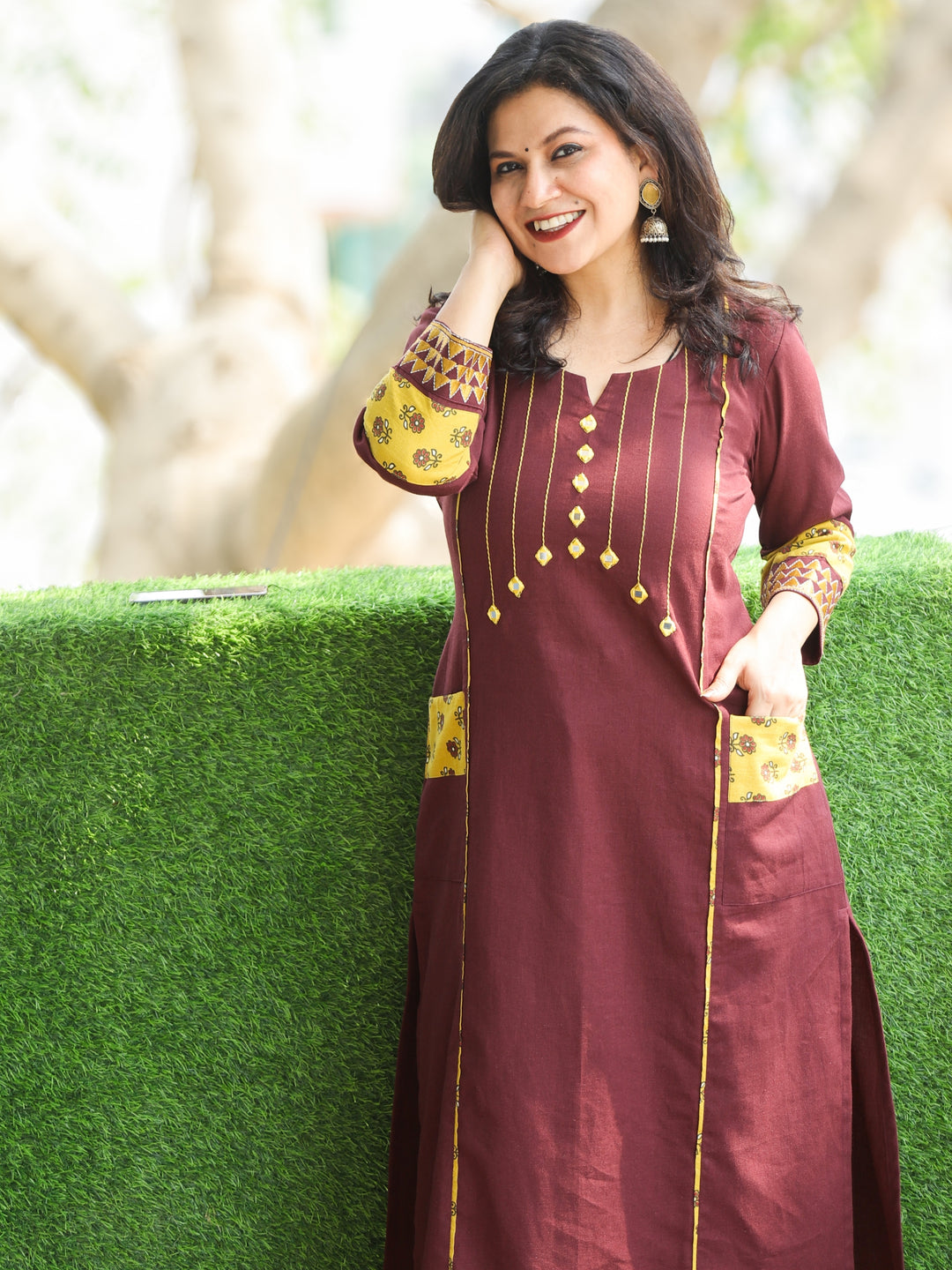 Aafeemi Plum Burgundy Mirror Neck Work with Pocket Cotton Kurti