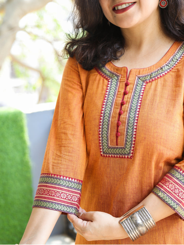 Sunaina Tangerine Orange Lace Work on Neck and Hem South Cotton Kurti