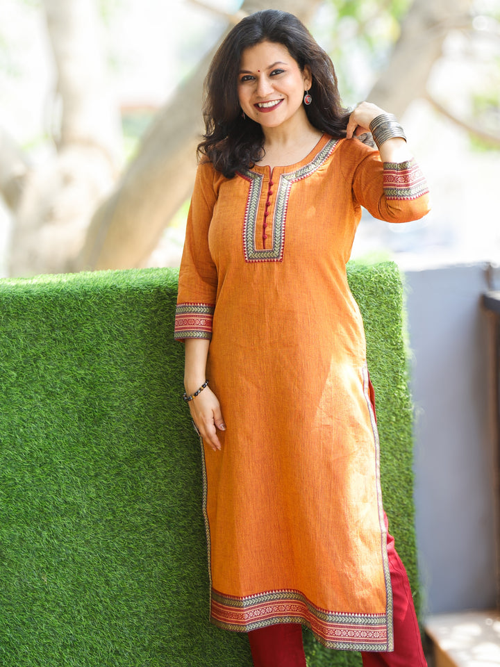 Sunaina Tangerine Orange Lace Work on Neck and Hem South Cotton Kurti