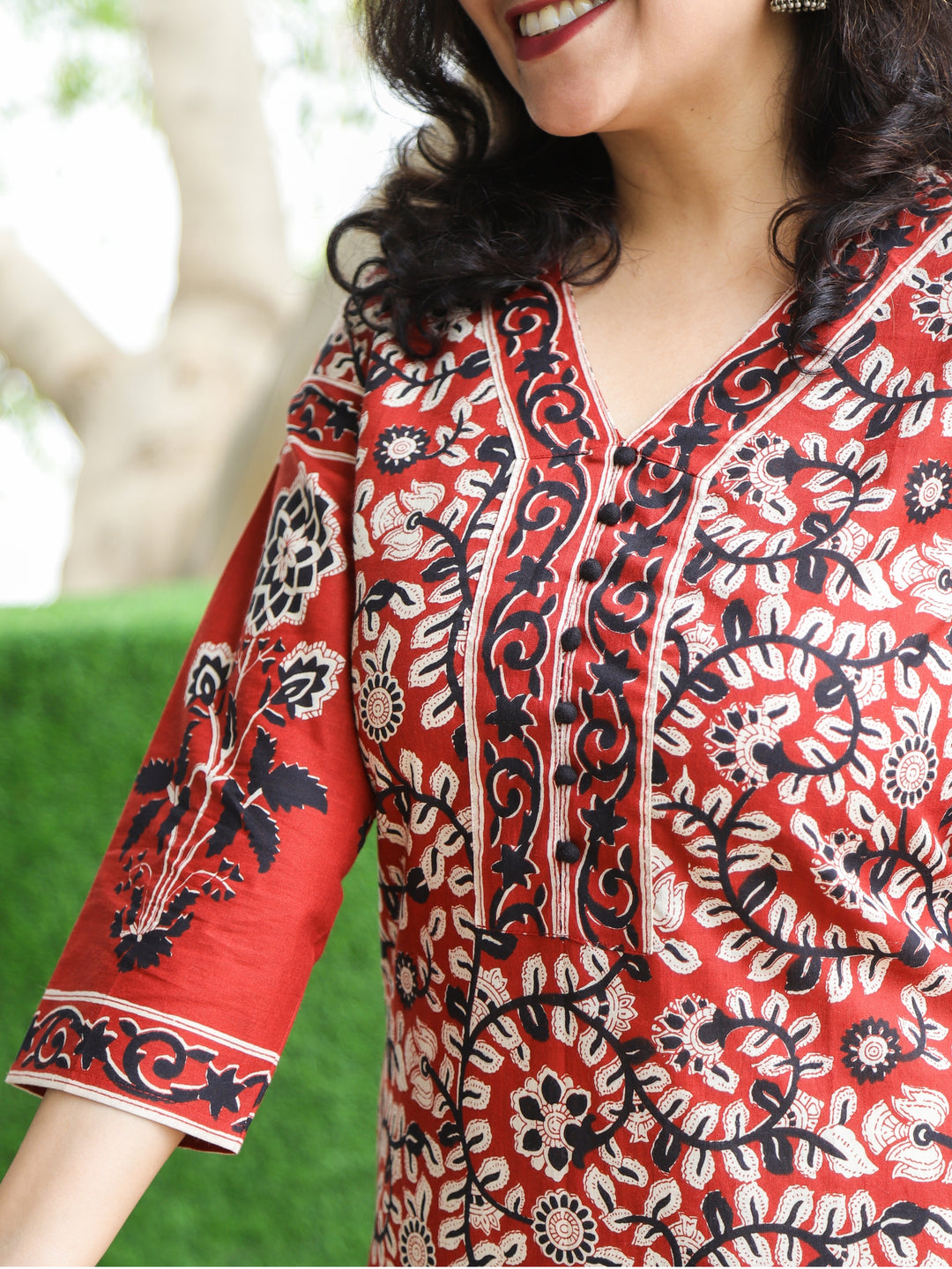 Pankhudi Berry Red Potli Button Neck Work Kalamkari Floral Printed Cotton Kurti