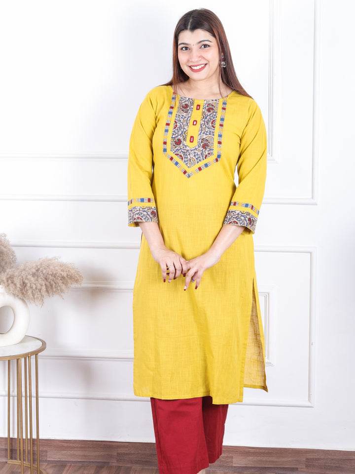 Dashtaan Turmeric Yellow Kalamkari Print Patch with Mirror Work Cotton Kurti