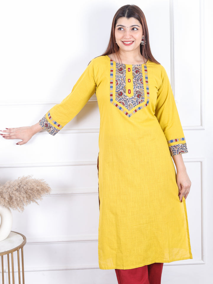 Dashtaan Turmeric Yellow Kalamkari Print Patch with Mirror Work Cotton Kurti