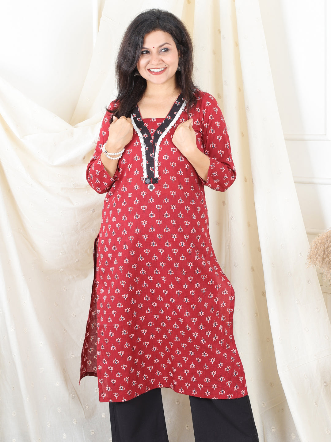 Hariyali Cranberry Red Lace Neck Work in Lotus Printed Cotton Kurti