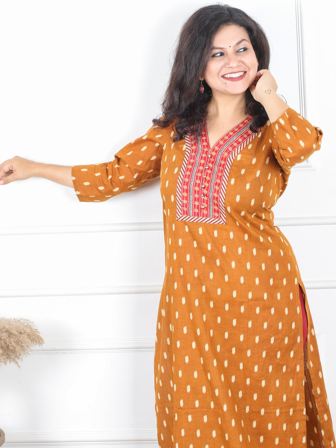 Hariyali Bronze Rust V Neck Lace Work in Ikkat Printed Cotton Kurti