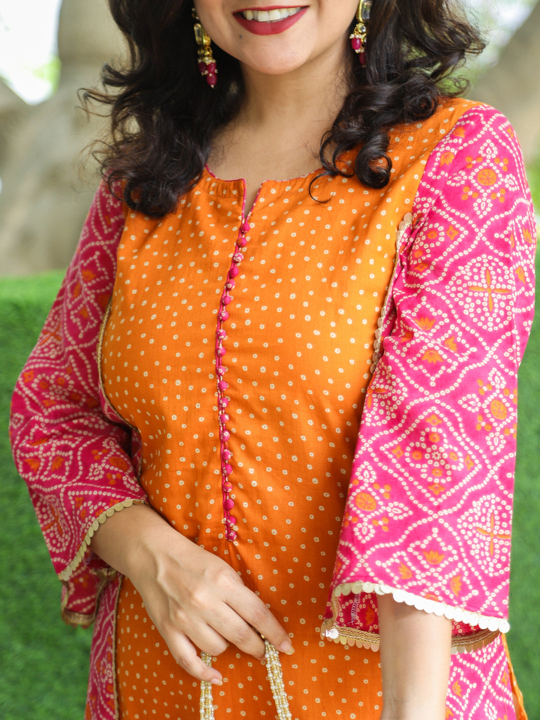 Hilori Orange Polka Dot Print with Potli Button in Rani Pink Panel Style Cotton Kurti