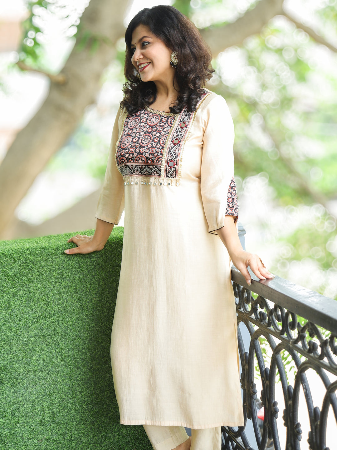 Nirvi Shell Beige Mashru Patch Work Neck with Mirror Work Roman Silk Kurti