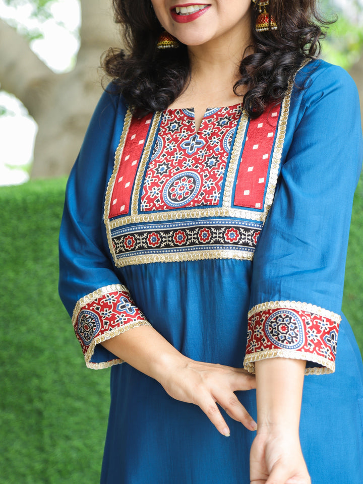 Nirvi Denim Blue Mashru Patch Work Neck with Golden Lace Roman Silk Kurti