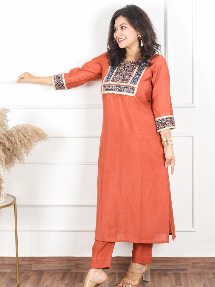 Nirvi Barn Rust Mashru Patch Work Neck with Golden Lace Roman Silk Kurti