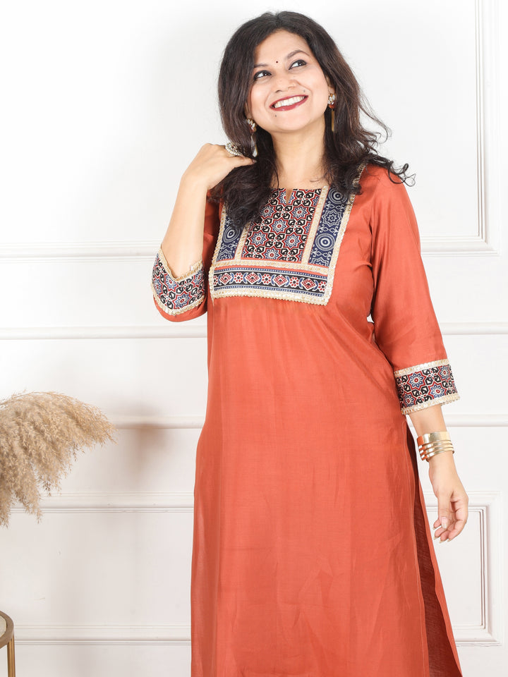 Nirvi Barn Rust Mashru Patch Work Neck with Golden Lace Roman Silk Kurti