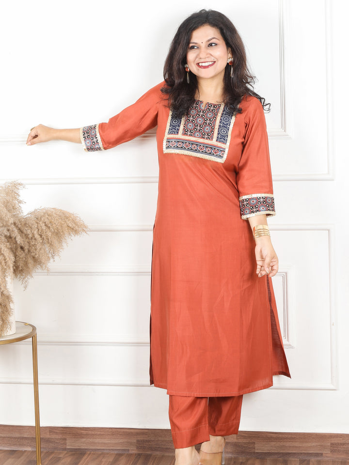 Nirvi Barn Rust Mashru Patch Work Neck with Golden Lace Roman Silk Kurti