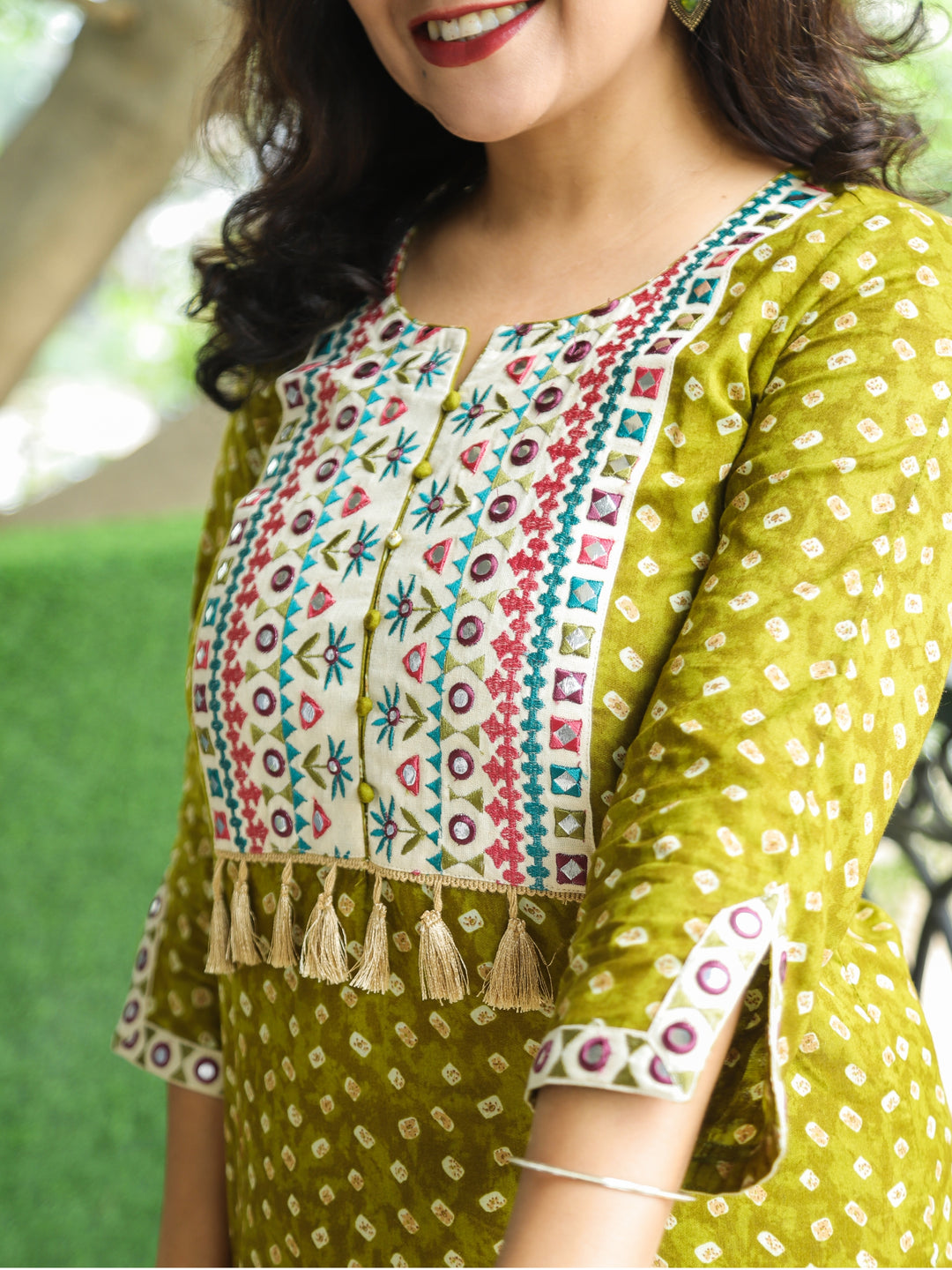 Varsha Olive Green Embroidered Yoke with Mirror Work Bandhej Print Cotton Kurti