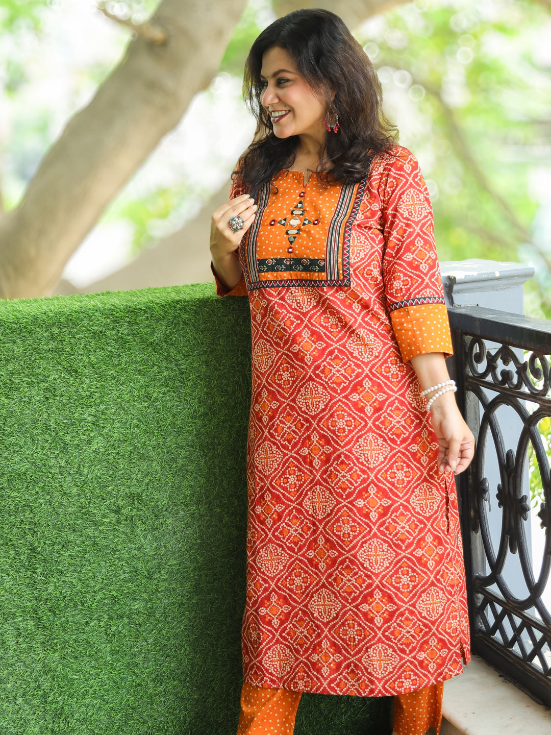 Ritu Burnt Red Mirror Work Neck Yoke in Bandhani Printed Cotton Kurti