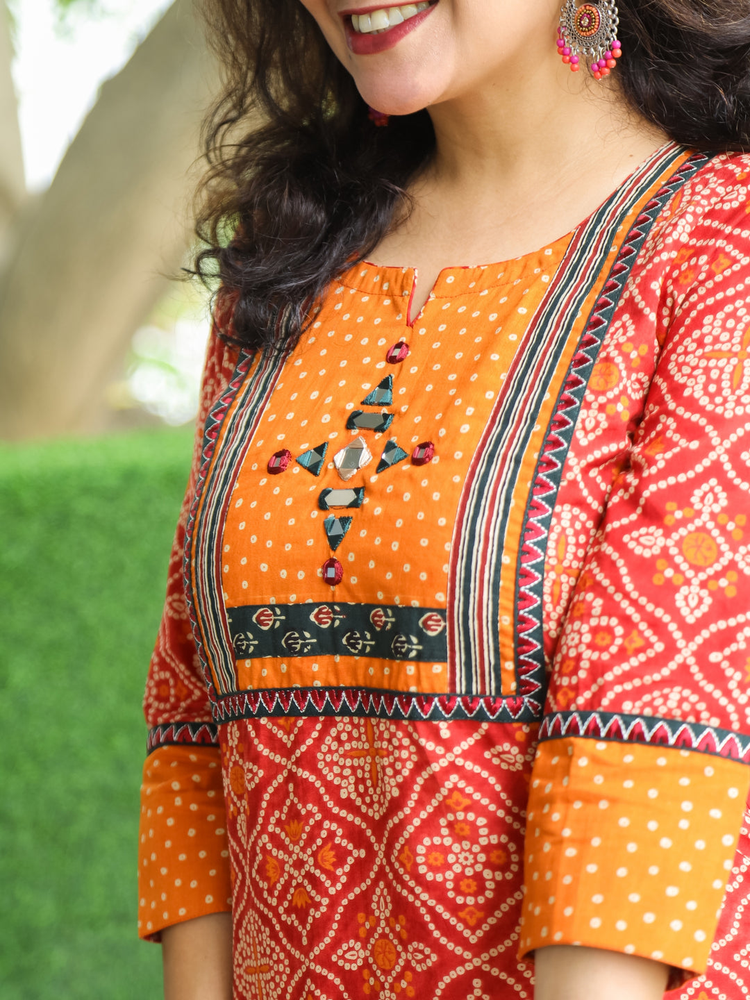 Ritu Burnt Red Mirror Work Neck Yoke in Bandhani Printed Cotton Kurti