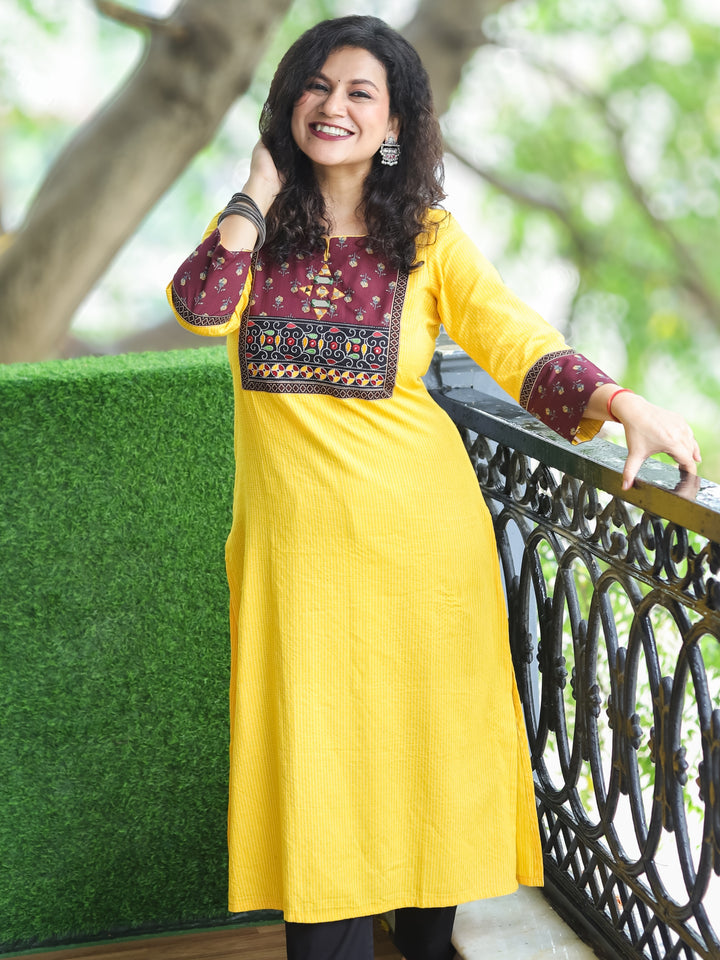 Mehek Bright Yellow with Floral printed Yoke and Mirror Work Running Stitch Cotton Kurti