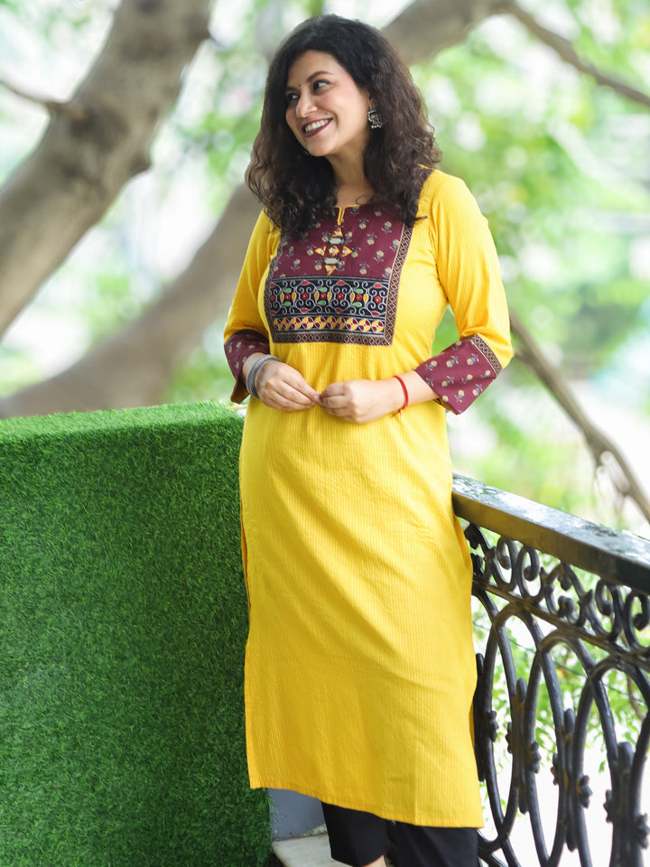 Mehek Bright Yellow with Floral printed Yoke and Mirror Work Running Stitch Cotton Kurti