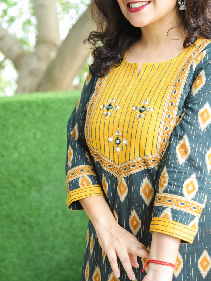 Ragini Pine Green Thread Work Yoke with Mirror Detailing in Ikkat Printed Cotton Kurti