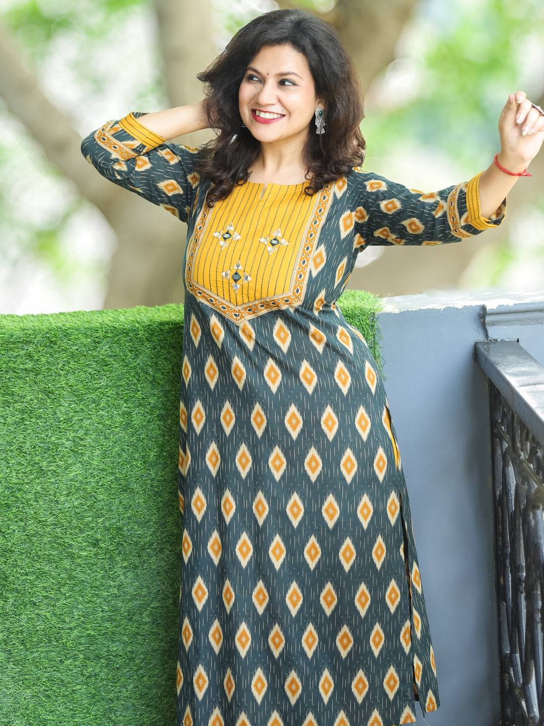 Ragini Pine Green Thread Work Yoke with Mirror Detailing in Ikkat Printed Cotton Kurti