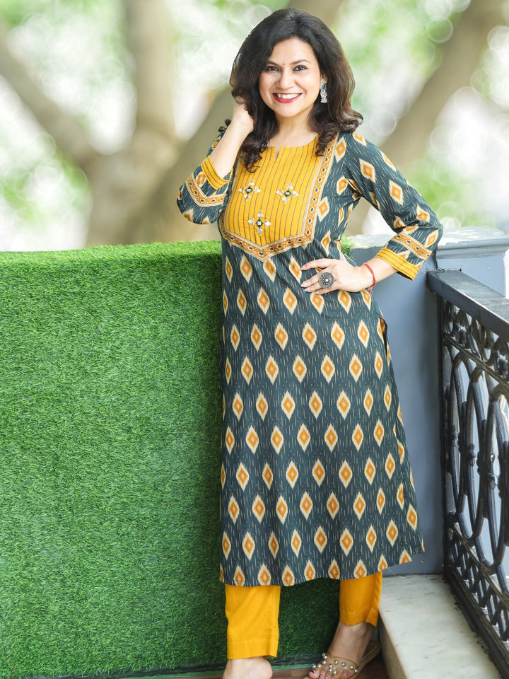 Ragini Pine Green Thread Work Yoke with Mirror Detailing in Ikkat Printed Cotton Kurti