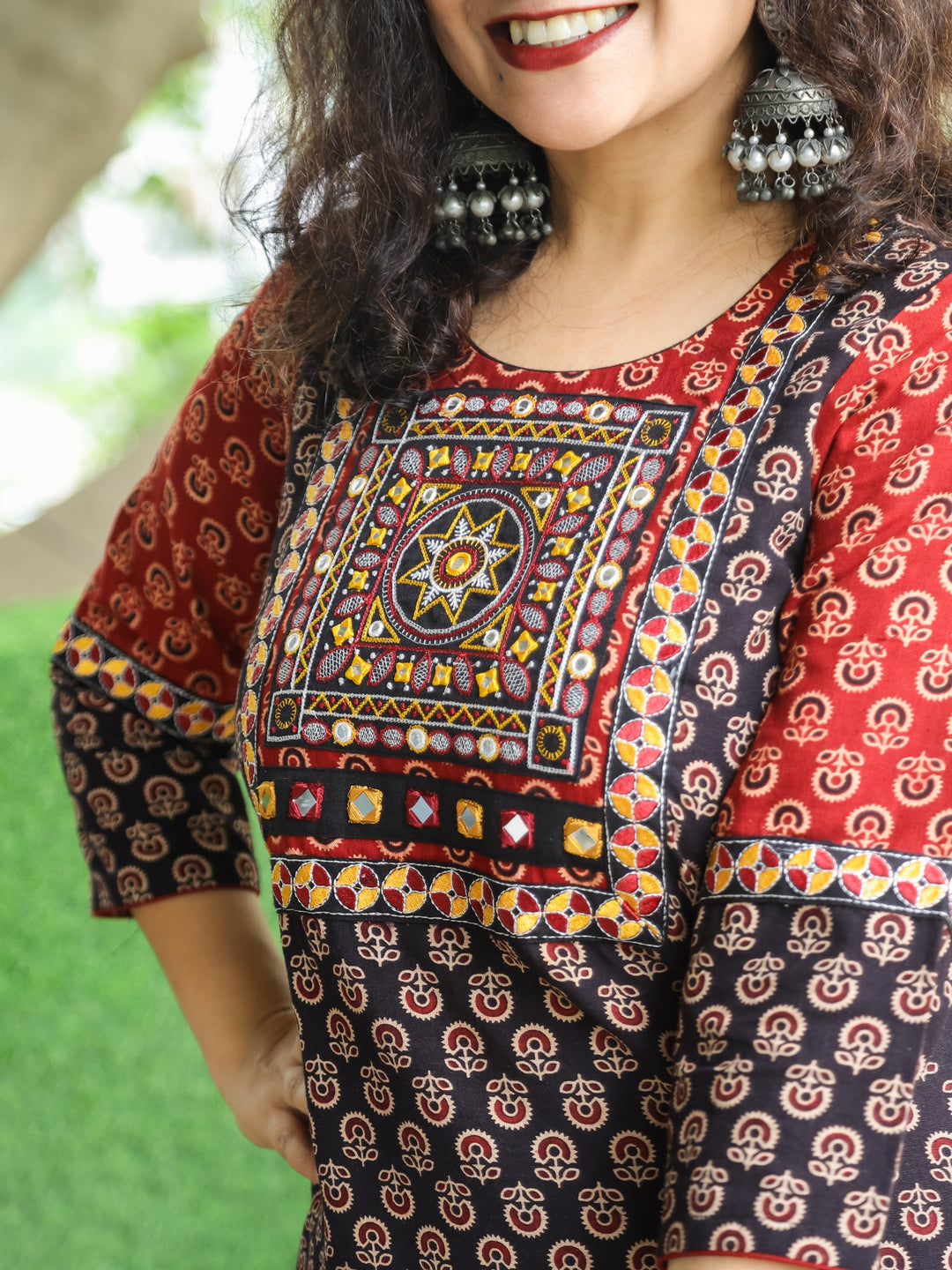 Gauri Ebony Black with Embroidered Patch Yoke in Gamthi Print Cotton Kurti