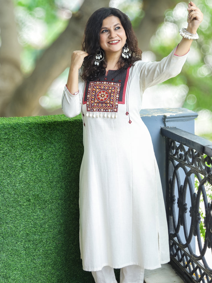 Vamika Off-White with Embroidered Patch Yoke with Shell Work Cotton Kurti