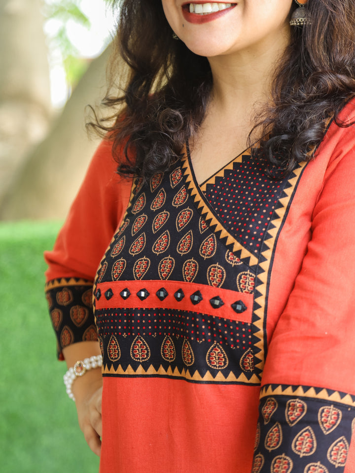Dua Pumpkin Rust Ajrak Print Yoke with MIrror on Angrakha Style Neck Cotton Kurti