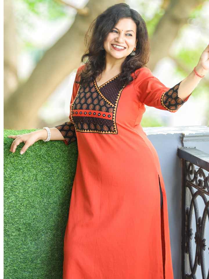 Dua Pumpkin Rust Ajrak Print Yoke with MIrror on Angrakha Style Neck Cotton Kurti