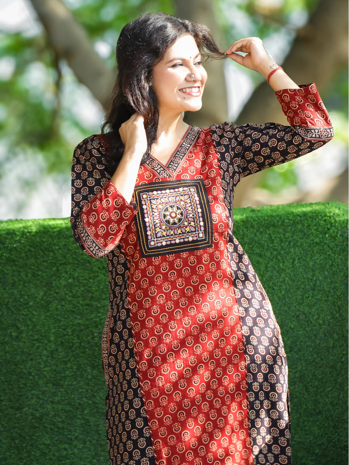 Keshvi Ebony Black V Neck Embroidered Patch in Panel Style Ajrak Printed Cotton Kurti