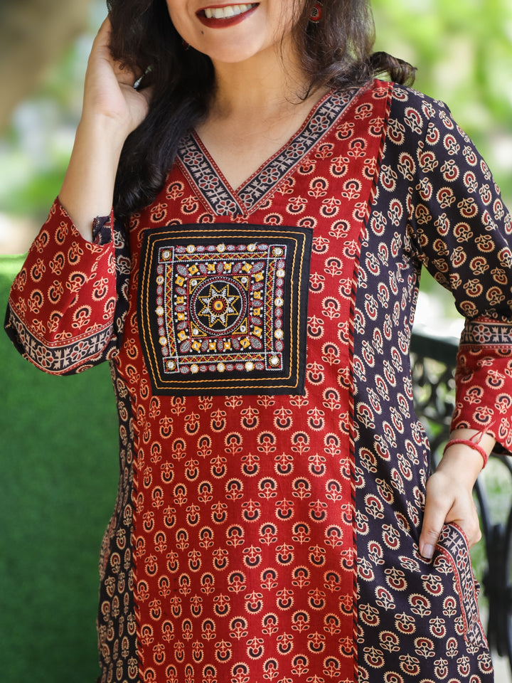 Keshvi Ebony Black V Neck Embroidered Patch in Panel Style Ajrak Printed Cotton Kurti