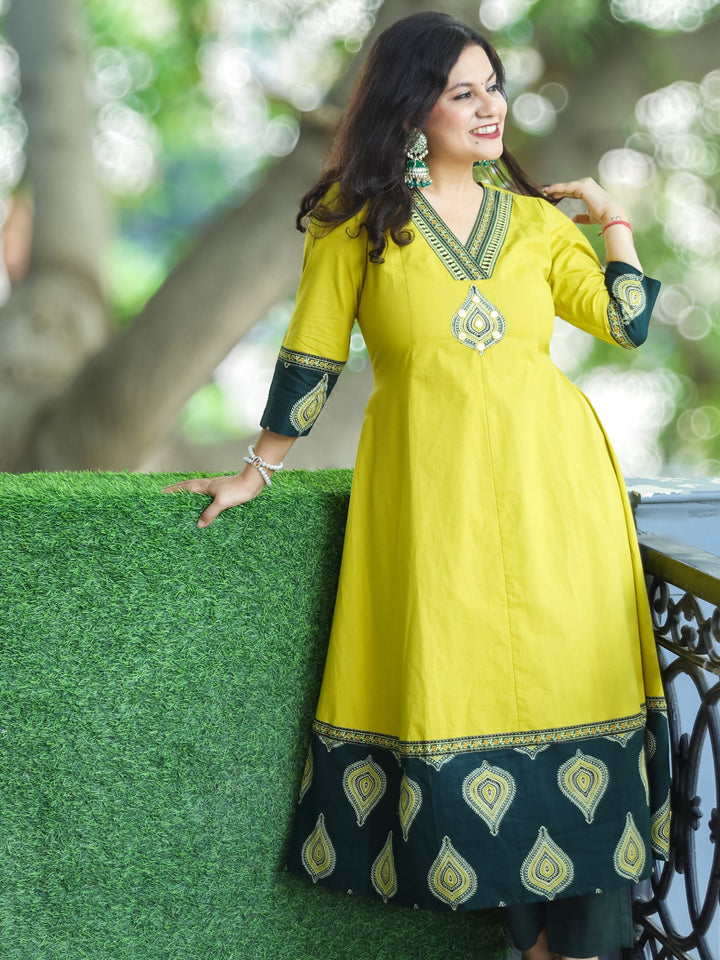 Rivaazi Lemon Yellow V Neck and Mirror Patch in Printed Hemline Anarkali Cotton Kurti