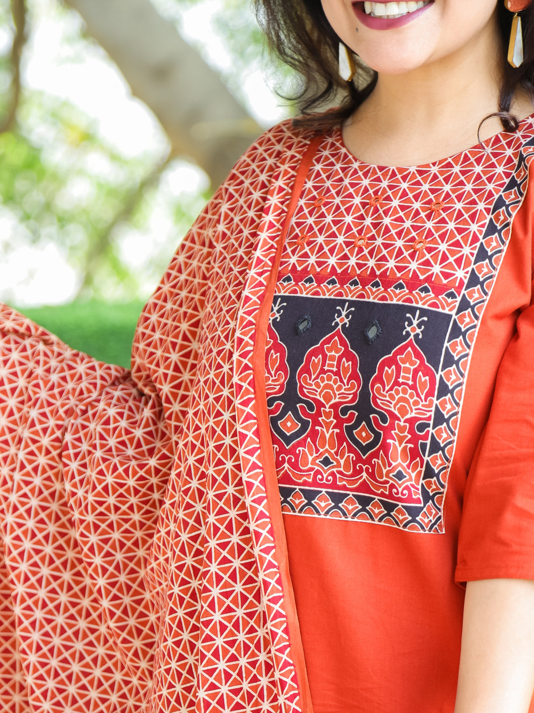 Swaroopi Burnt Orange Ajrak Printed Yoke with Mirror Work Cotton 3 Piece Set