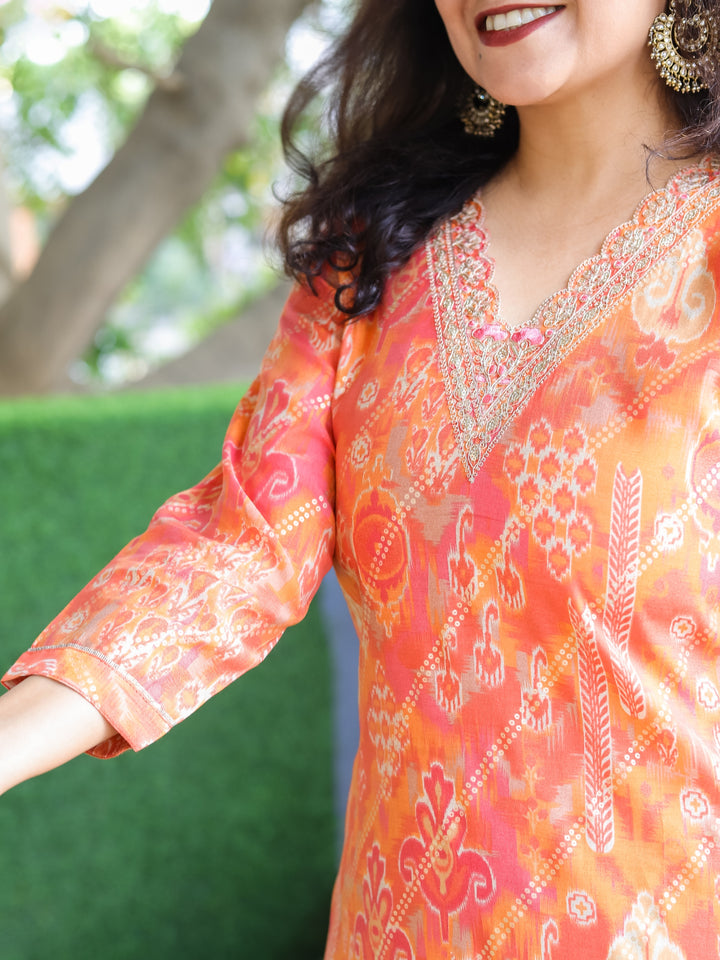 Daarshvi Pumpkin Orange V Embellish Neck Work in Digital Floral Print Modal Kurti
