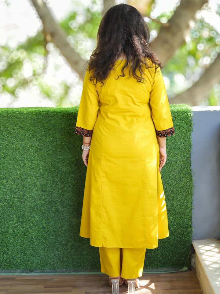 Saiyara Turmeric Yellow V Neck Lace Work with Embroiered Pocket Cotton 2 Piece Set