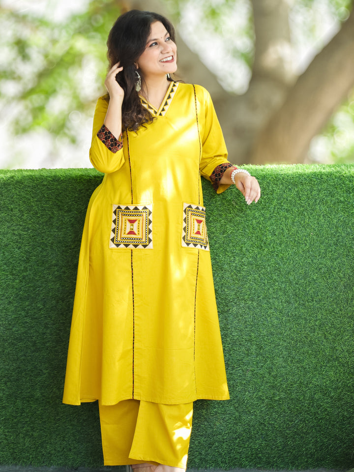 Saiyara Turmeric Yellow V Neck Lace Work with Embroiered Pocket Cotton 2 Piece Set