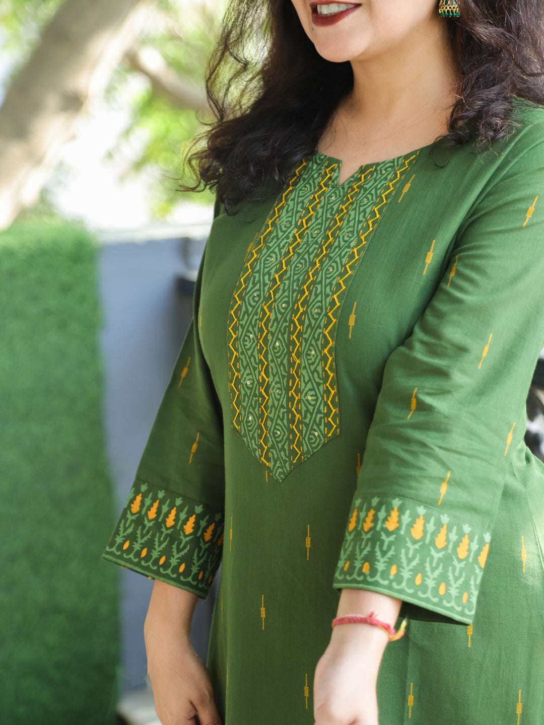 Saloni Forest Green Thread with Sequine Work in Pigment Printed Cotton Kurti