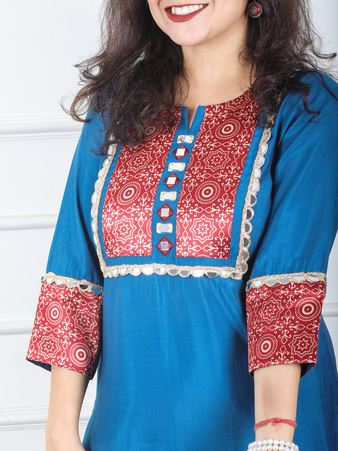 Mayuri Amber Paint Blue Mashru Patch Work Neck with Mirror Lace Roman Silk Kurti