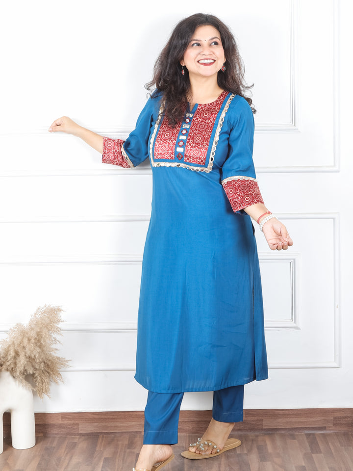 Mayuri Amber Paint Blue Mashru Patch Work Neck with Mirror Lace Roman Silk Kurti