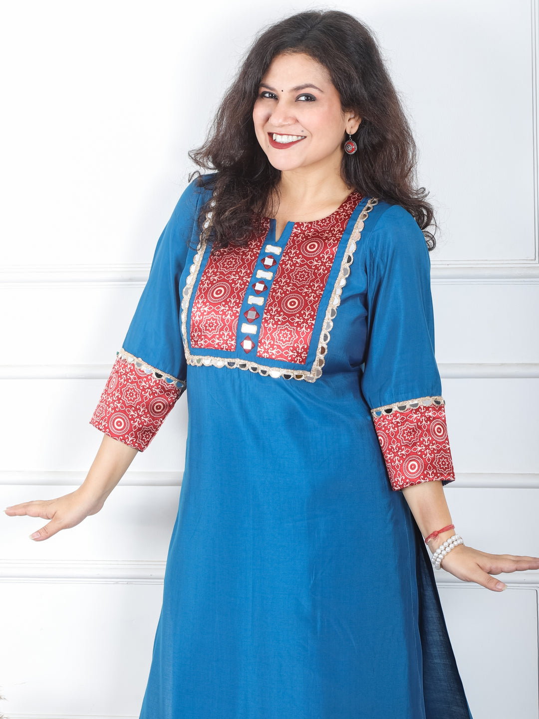 Mayuri Amber Paint Blue Mashru Patch Work Neck with Mirror Lace Roman Silk Kurti