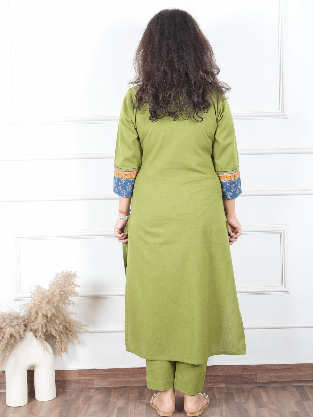 Payal Pine Green V Neck with Floral Printed Yoke in Plain Cotton Kurti