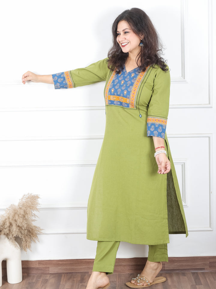 Payal Pine Green V Neck with Floral Printed Yoke in Plain Cotton Kurti