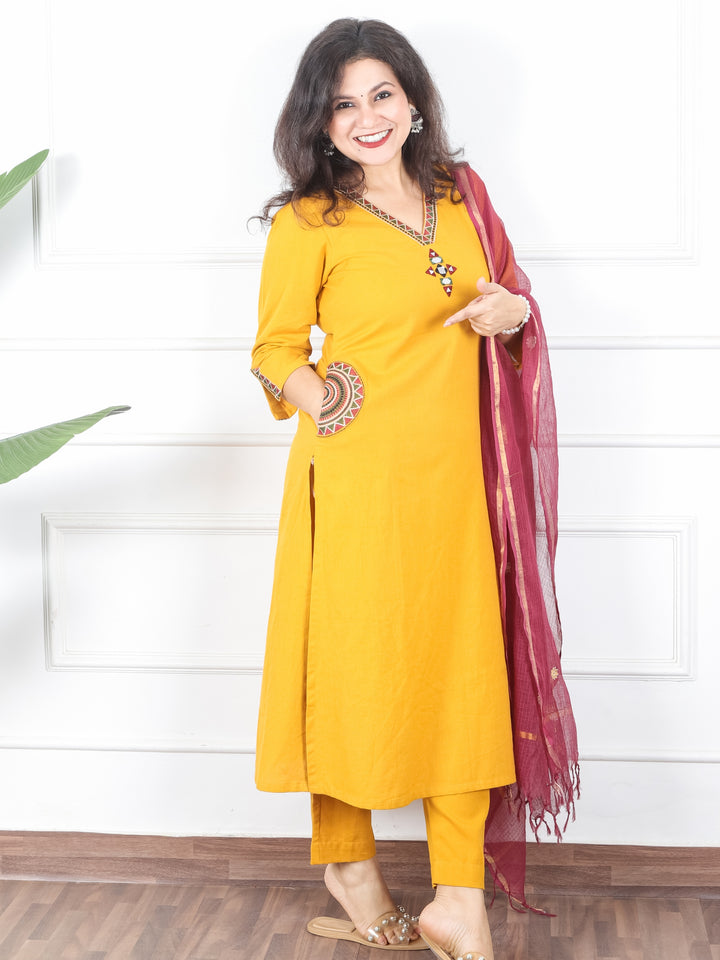 Kaveri Turmeric Yellow V Neck Mirror Work with Embroiered Pocket Cotton 3 Piece Set