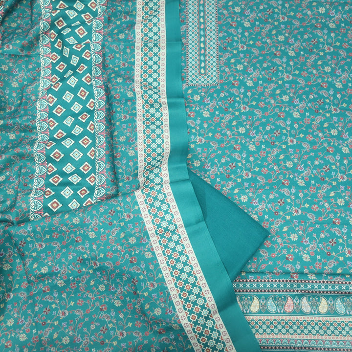 Ruhaan Primal Green  Floral Kanni Printed Semi Pashmina Suit Set
