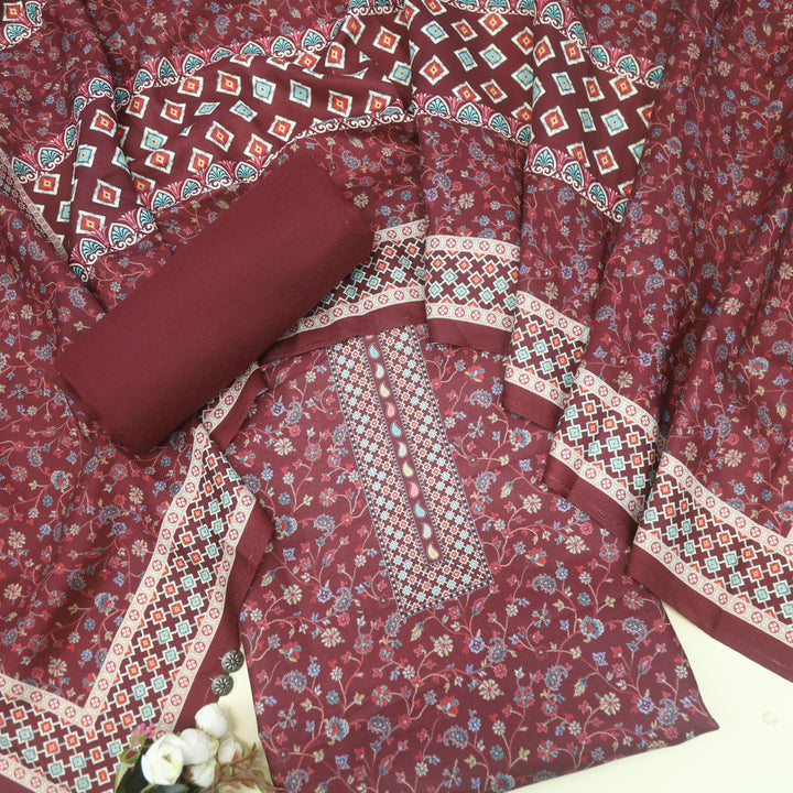 Ruhaan Merlot Red Floral Kanni Printed Semi Pashmina Suit Set