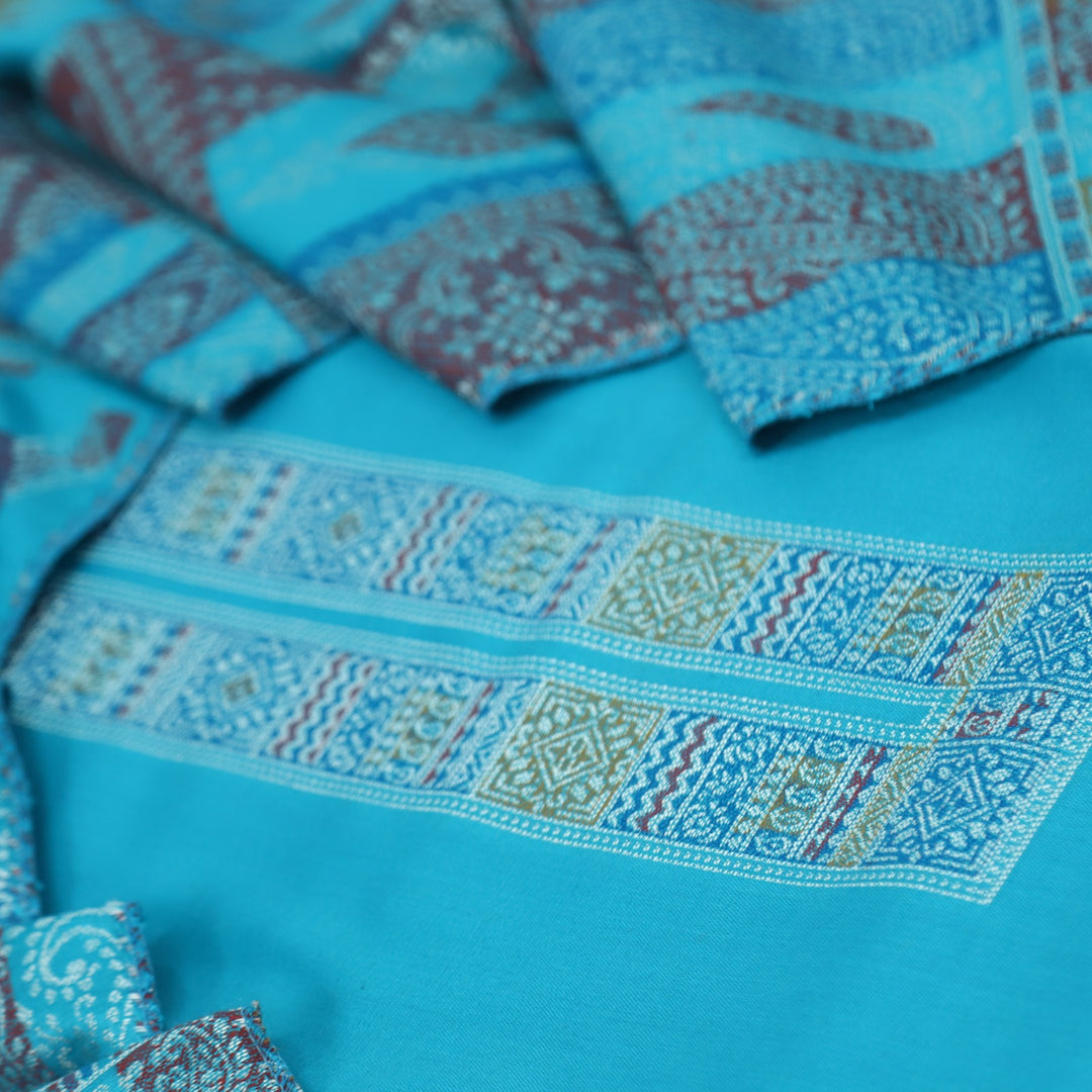 Shokhiyon Turquoise Blue Weaved Semi Pashmina Suit Set