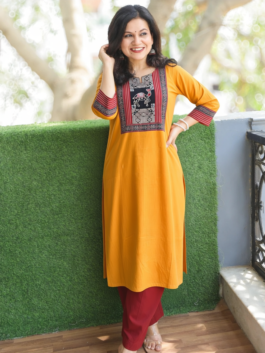 Megha Yellow Mirror Work Camel Yoke Cotton Kurti