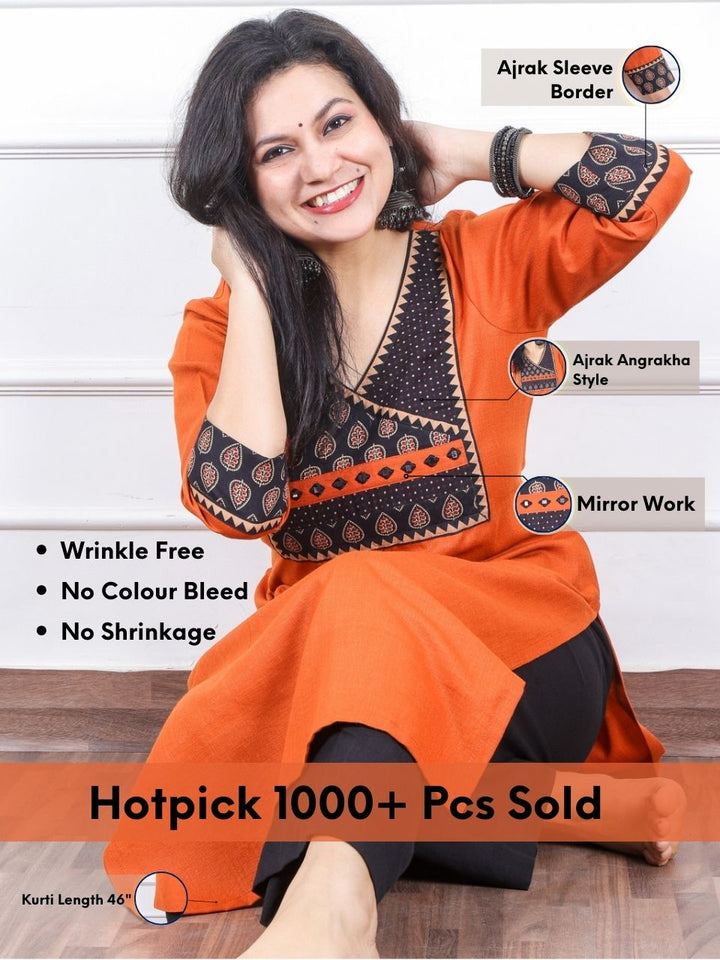 Dua Pumpkin Orange with Ajrak Print Patch Angrakha Style Neck Magic Linen Kurti