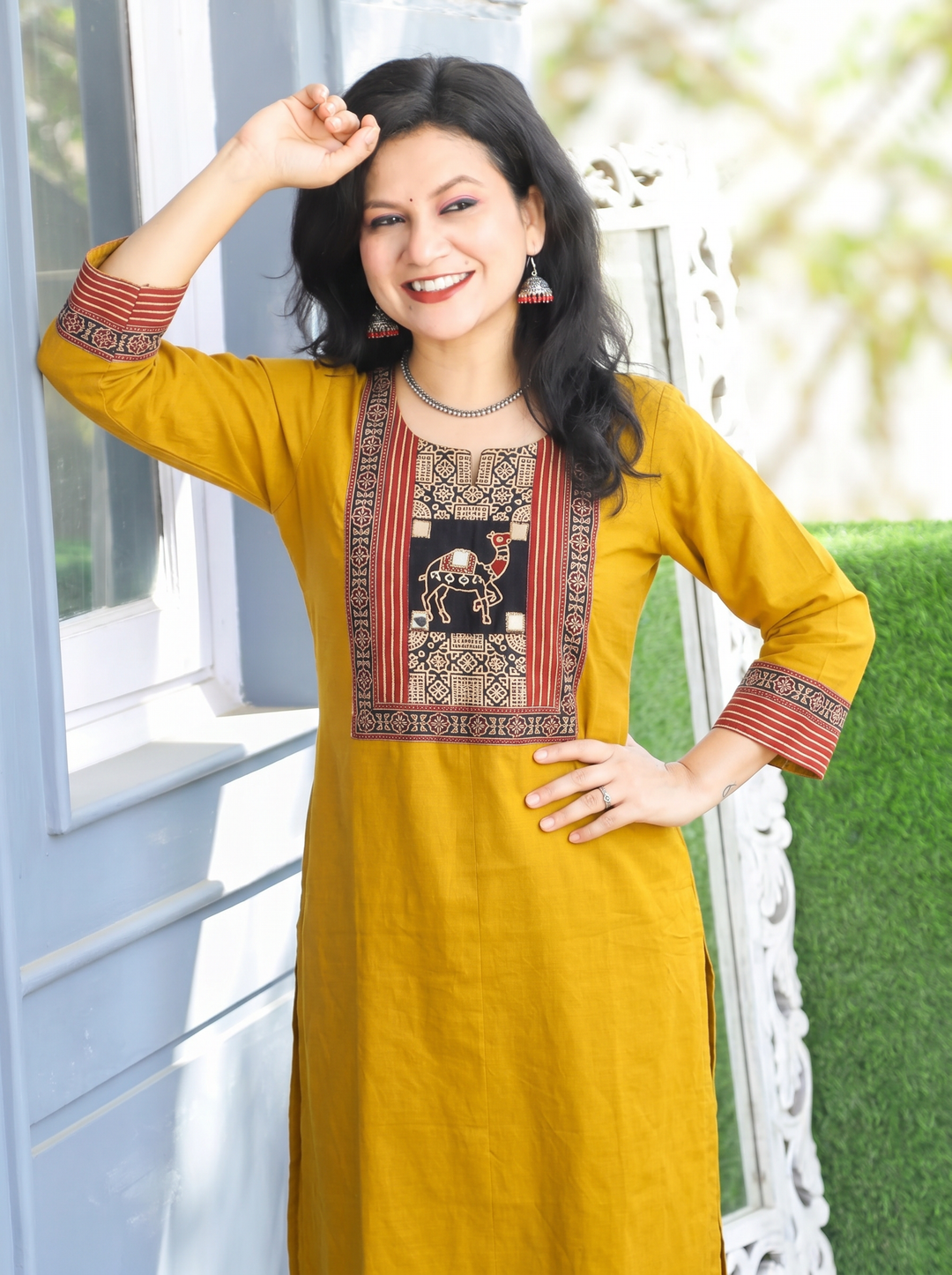 Megha Yellow Mirror Work Camel Yoke Cotton Kurti